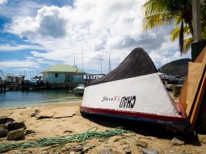A row boat waits for its skipper on the beach in Philipsburg, St. Maarten