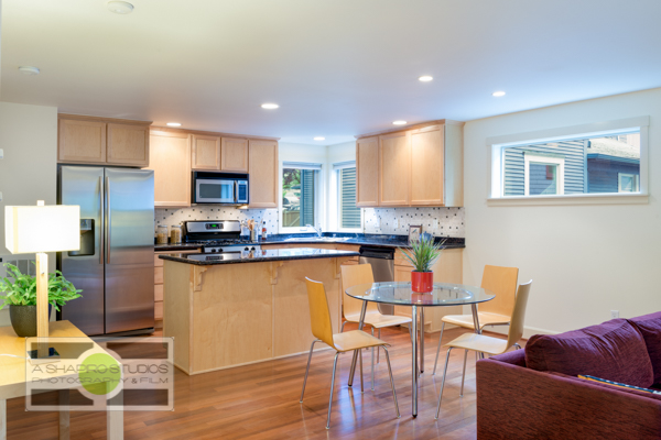 The kitchen and dining room of a Fremont Townhouse, listing soon.  Seattle Real Estate Photography ©2015 Ari Shapiro - AShapiroStudios.com