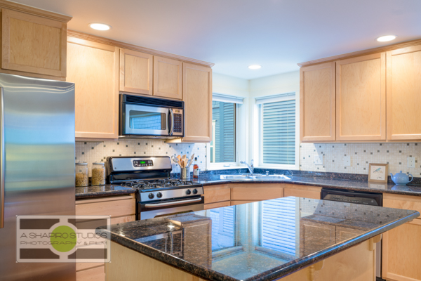 The kitchen of a Fremont Townhouse, listing soon.  Seattle Real Estate Photography ©2015 Ari Shapiro - AShapiroStudios.com