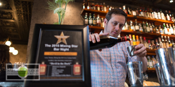 Bartender Leroy Thomas making his award winning Disronno cocktail Devil in the Dark. Seattle Event Photography ©2015 Ari Shapiro - AShapiro Studios.com