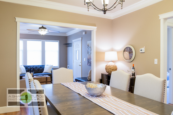 An open-concept living and dining room of a Ballard updated Craftsman house.  Seattle Real Estate Photography ©2015 Ari Shapiro - AShapiroStudios.com