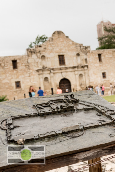 A well-worn copper plaque outside The Shrine shows the layout of The Alamo as it was in 1836, including The Shrine in the background.  Travel Photography ©2015 Ari Shapiro - AShapiroStudios.com