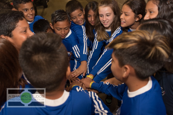 Players from Soccer Centro were thrilled to participate in the opening ceremonies of the Mexico vs Honduras match at NRG Stadium.  Houston Event Photography ©2015 Ari Shapiro - AShapiroStudios.com