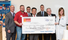As part of the $10.5M being donated to various medical centers across the country, children receiving treatment for cancer at Seattle Children's Hospital were among the attendees of the ceremony where representatives from Hyundai, including local dealers, presented a $250,000 grant to the hospital to fund treatment programs as part of the Hope On Wheels program.  Seattle Corporate Event Photography ©2015 Ari Shapiro - AShapiroStudios.com