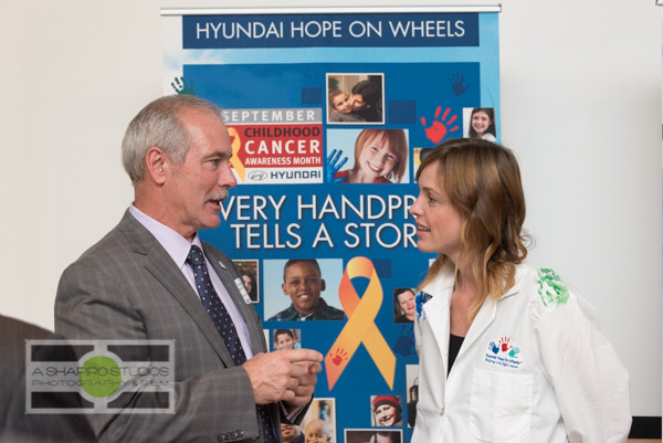As part of the $10.5M being donated to various medical centers across the country, children receiving treatment for cancer at Seattle Children's Hospital were among the attendees of the ceremony where representatives from Hyundai, including local dealers, presented a $250,000 grant to the hospital to fund treatment programs as part of the Hope On Wheels program. Seattle Corporate Event Photography ©2015 Ari Shapiro - AShapiroStudios.com
