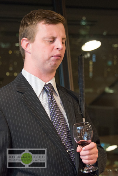 At the Space Needle in Seattle, members of the media and VIPs were invited to a Tasting In The Dark of Francis Ford Coppola wines. This sensory experience challenged guests to pick out aromas of base flavors then a flight of 4 of the company's bottlings - all while blindfolded. Hobey Wedler, a graduate student working toward his PhD in Chemistry (and blind since birth) led the group through the experience. Seattle Corporate Event Photography ©2015 Ari Shapiro - AShapiroStudios.com