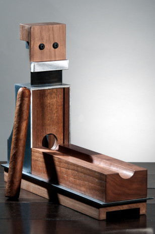 One of the many custom cigar accessories made by Pepperbox, this table-top cigar cutter makes a statement.